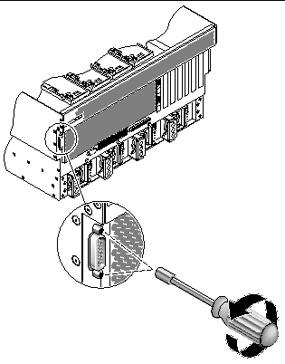 Figure showing how to remove the two screws that secure the alarm port connector to the rear of the system.